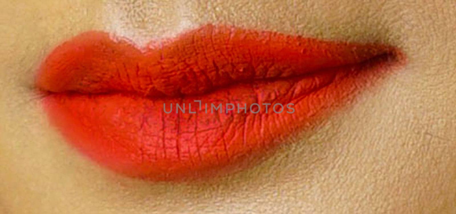 Beautiful Young Woman Healthy Lips. Female lips with vibrant lipstick color. Lip Care And Beauty for multimedia