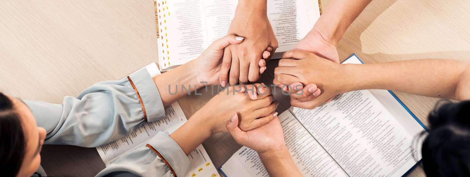 Cropped image of prayer group hold hand together with believe. Burgeoning. by biancoblue