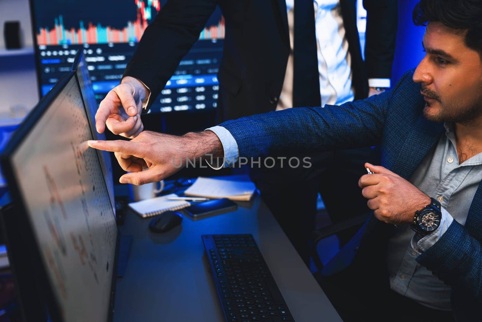 Two stock investors pointing interest market stock on monitor screen. Sellable. by biancoblue