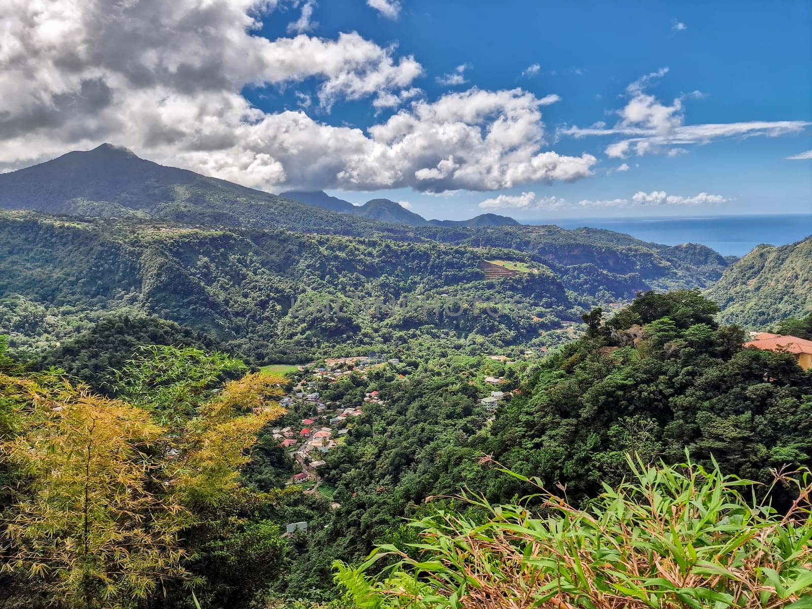 Travel reportage showing the lush, mountainous Caribbean hinterland countryside
