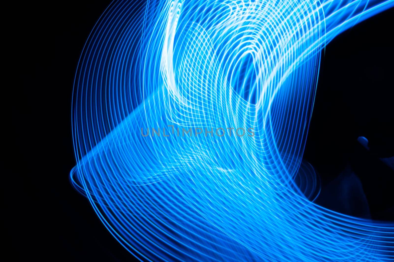 Abstract neon metallic blue curvy lines modern banner design on dark background. by PaulCarr