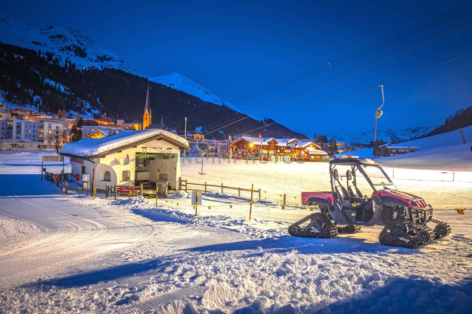 Idyllic mountain town of Davos in Swiss Alps ski slope evening view, Graubunden region of Switzerland