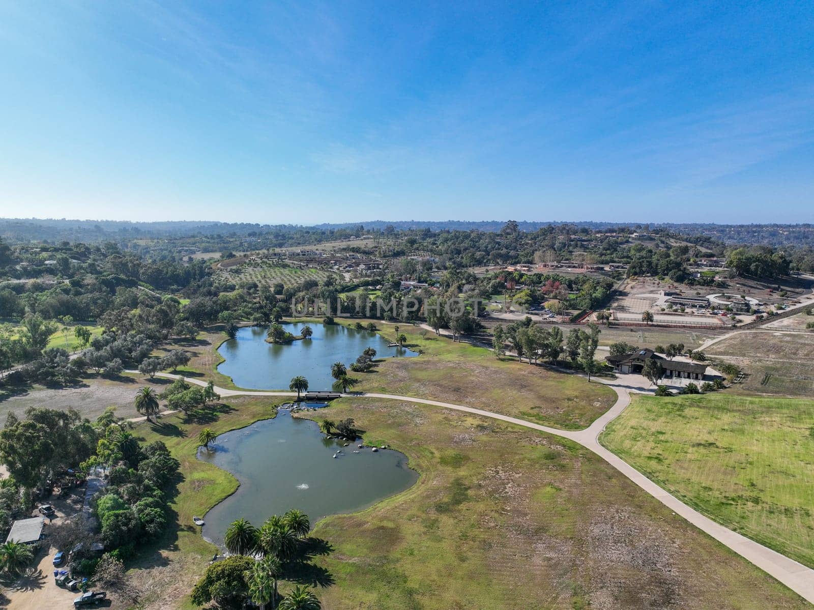 Aerial view over Rancho Santa Fe green valley landscape in San Diego by Bonandbon