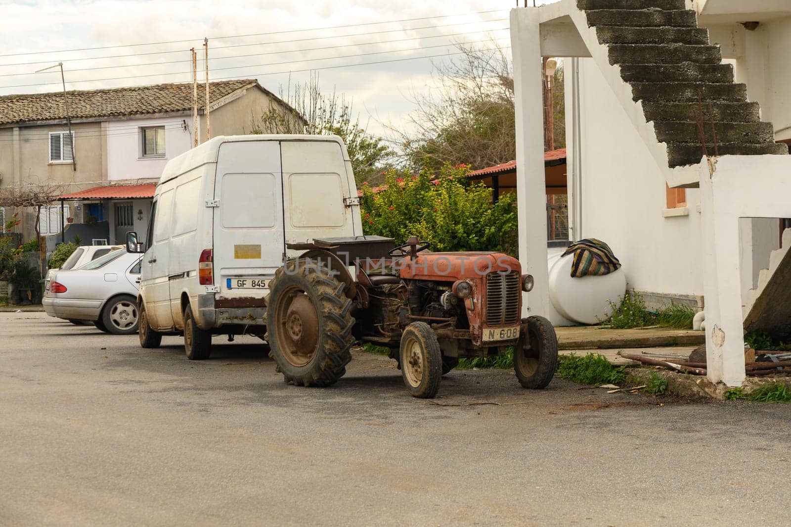 Gaziveren/ Cyprus - 02.03.2024: old tractor in a village in Cyprus in winter