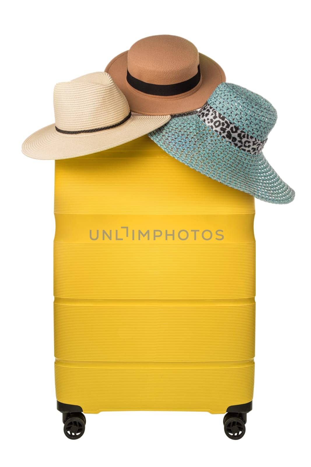 Travel yellow suitcase with hats hanging on top isolated on white background. Travel shopping or travel choice concept by dmitryz