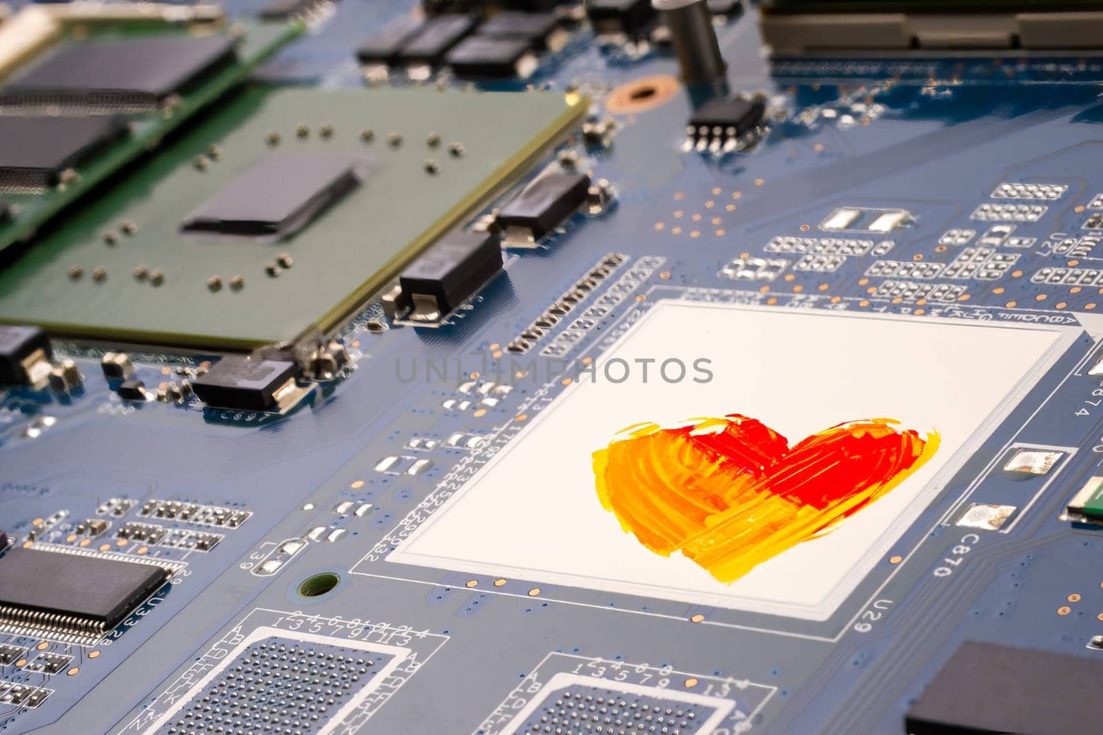 A motherboard PCB with a heart painted on it by bRollGO