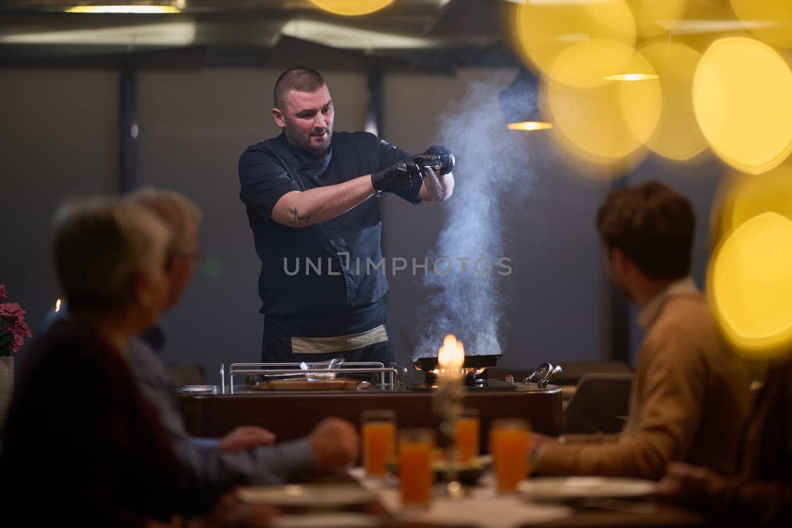 In a restaurant setting, a professional chef presents a sizzling steak cooked over an open flame, while an European Muslim family eagerly awaits their iftar meal during the holy month of Ramadan, blending culinary artistry with cultural tradition in a harmonious dining experience by dotshock