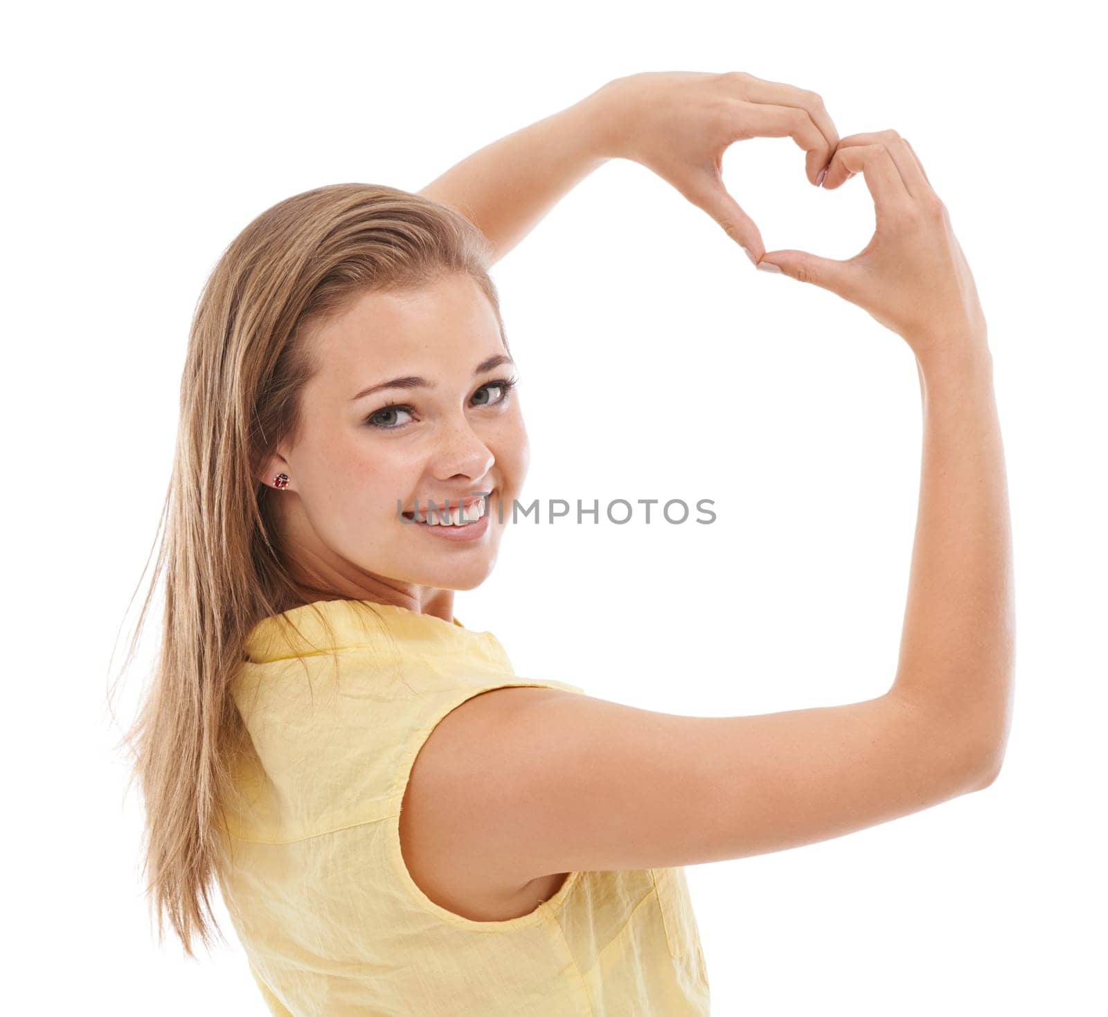 Woman, portrait and heart hands for love in studio, kindness and peace emoji or symbol. Happy female person, support icon and smiling on white background, romance emoticon and feedback or review.