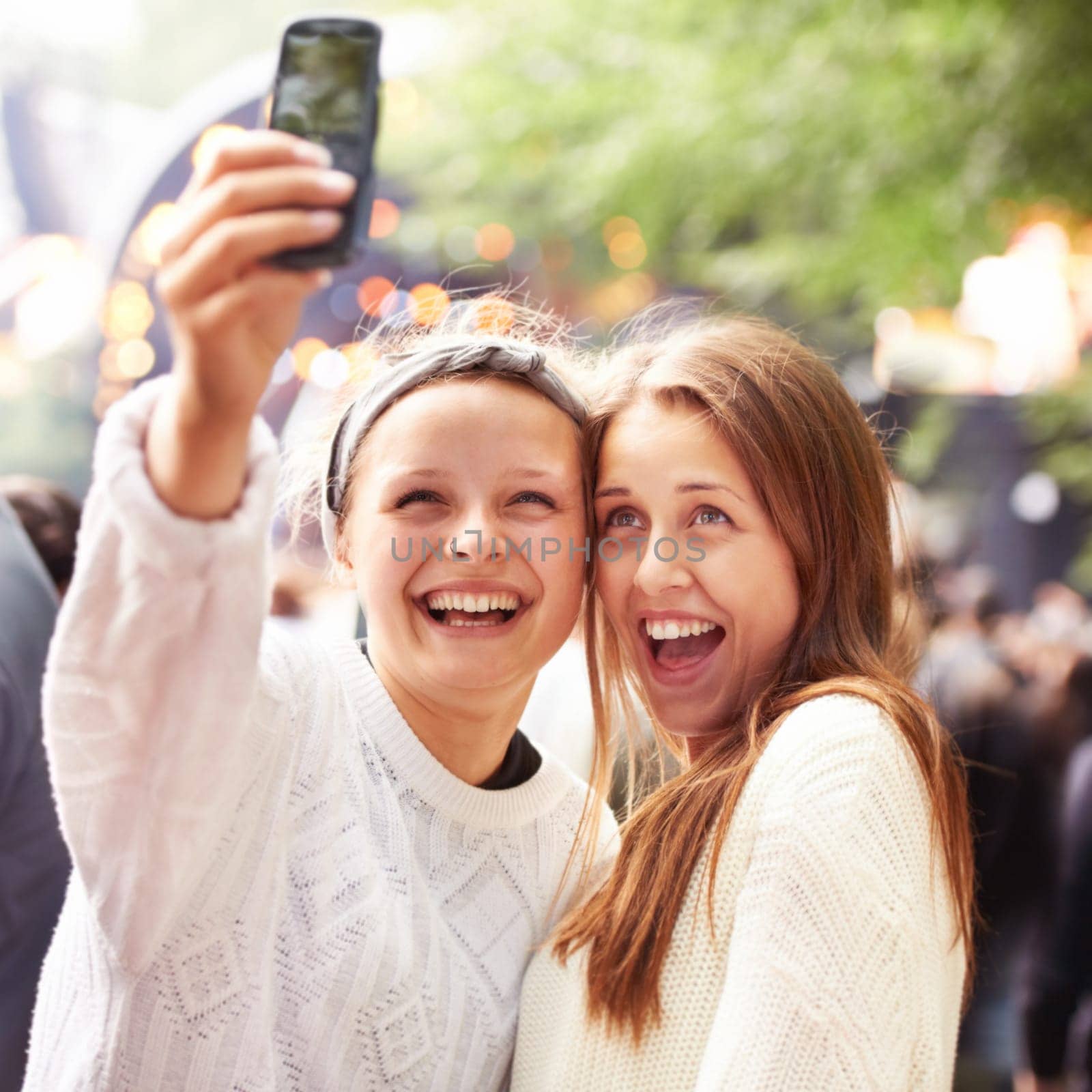 Friends, women and selfie and music festival for happy memory and social media outdoor at event. Excited people in a profile picture or photography at concert, event or holiday party for celebration by YuriArcurs