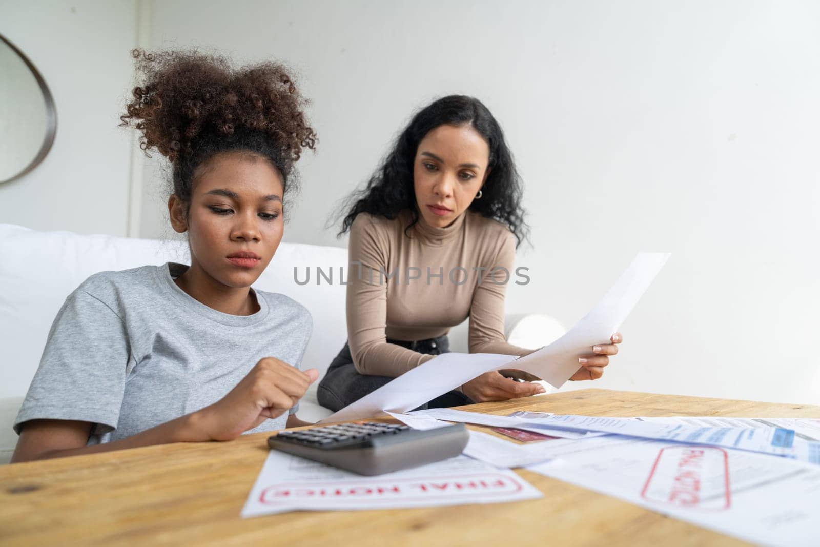 Stressed African women has financial problems credit card debt to pay crucial by biancoblue