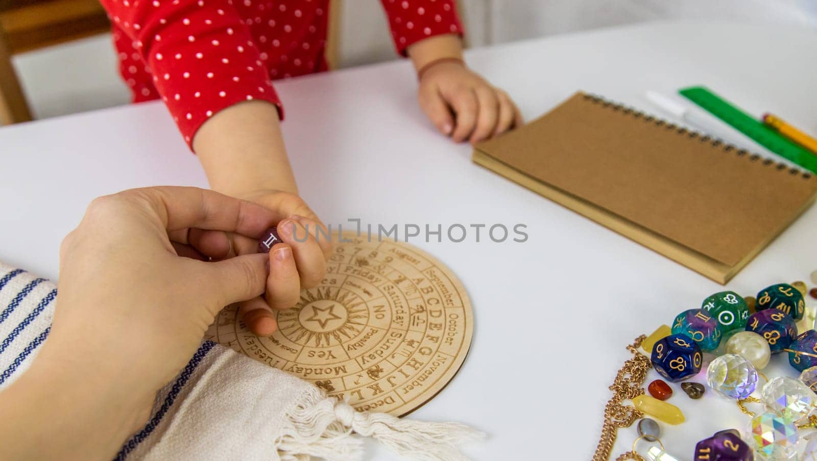 Numerology numbers on the table. Selective focus. Kid.