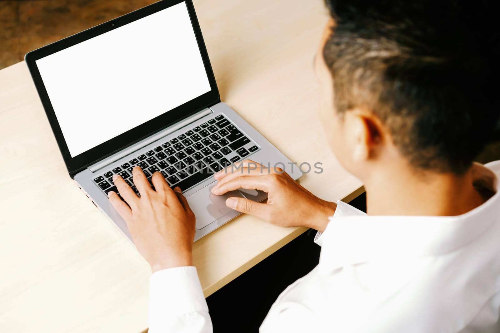 Business person worker uses a laptop computer. uds by biancoblue