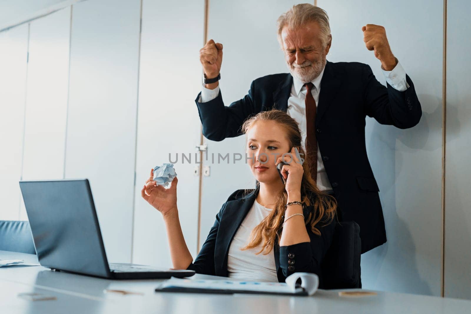 Businessman boss feels angry and mad at bad misbehaving businesswoman employee who ignores the work tasks at the workplace. Firing workers and human resources management problem concept. uds