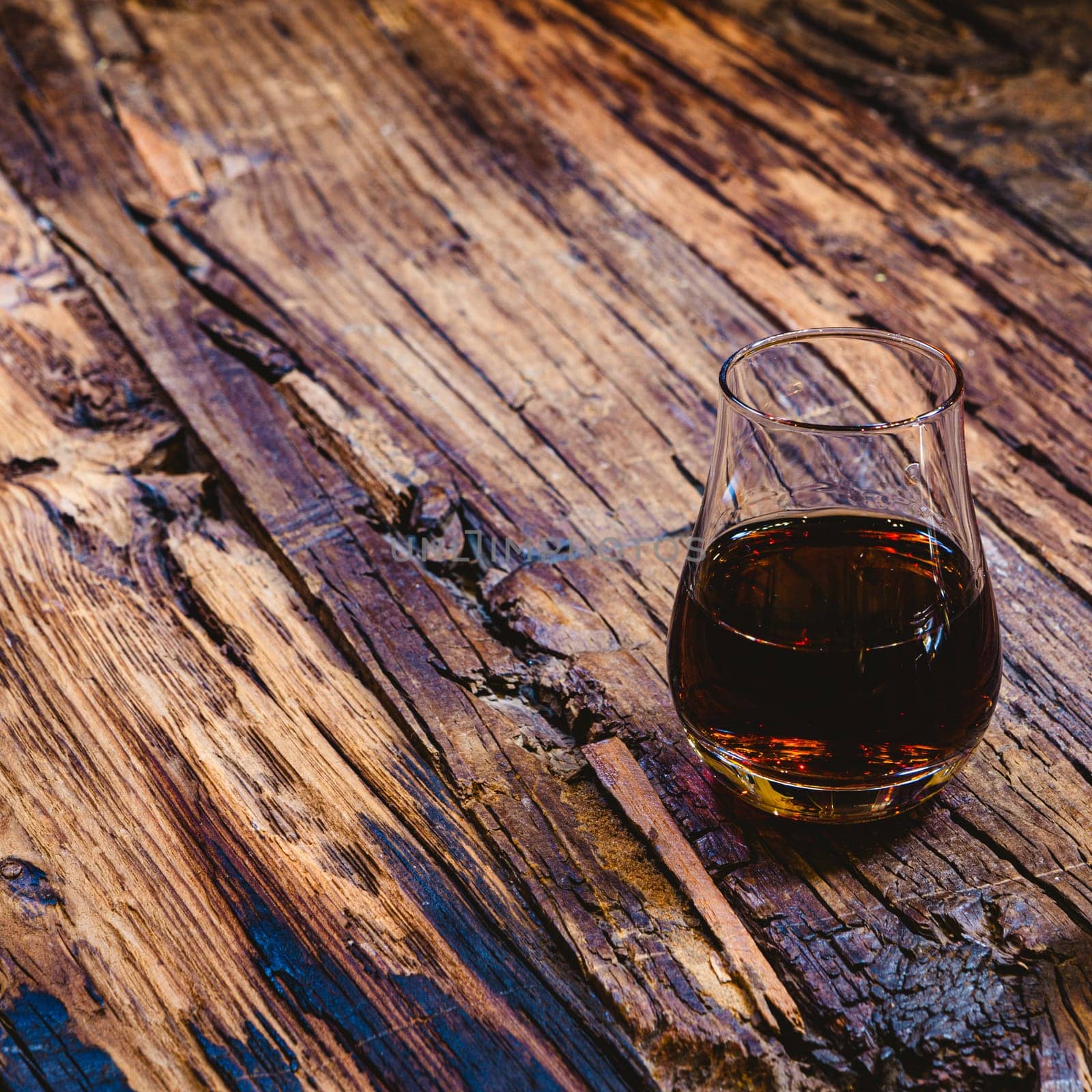 Close Up of a Glass of Sweet Madeira Fortified Wine by sarymsakov