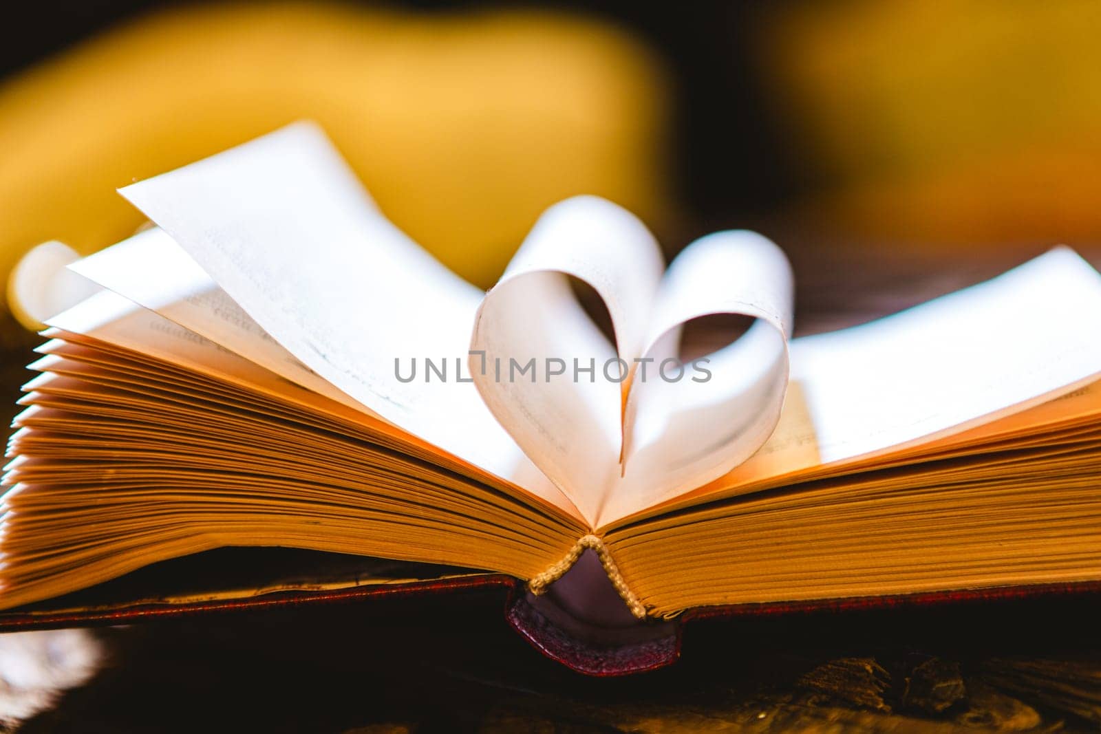 book with its pages shaping as heart. Resolution and high quality beautiful photo by sarymsakov