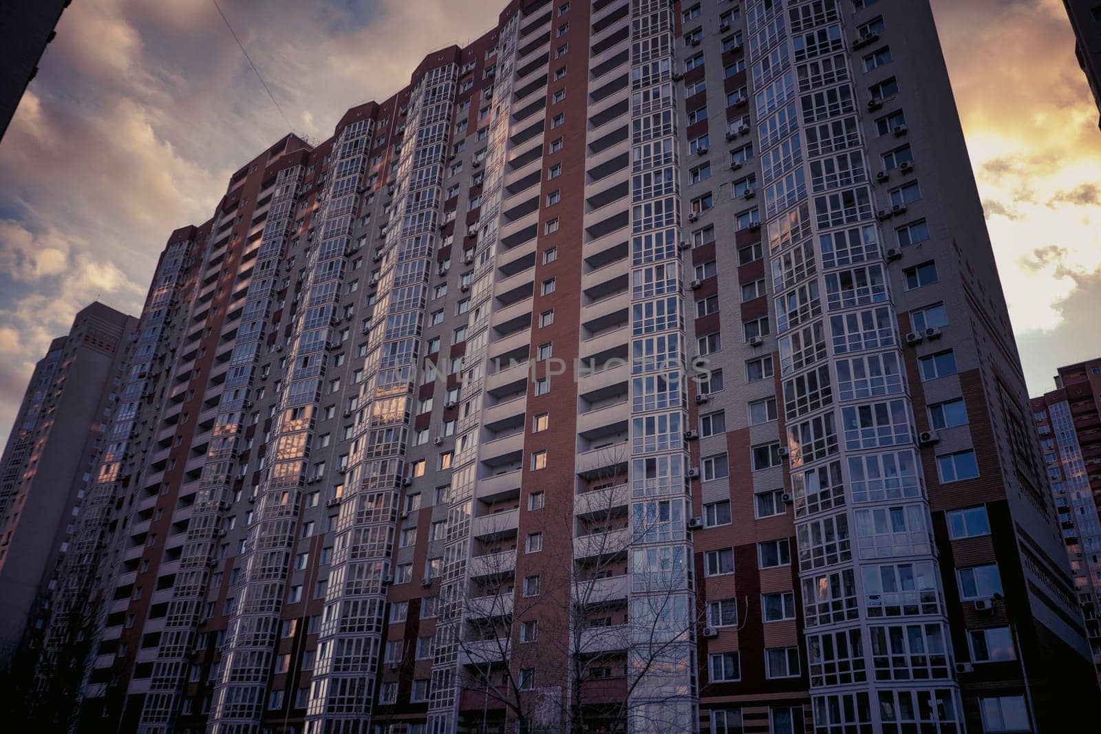 city building houses evening view skyline and sky background real estate cute town. toned photo