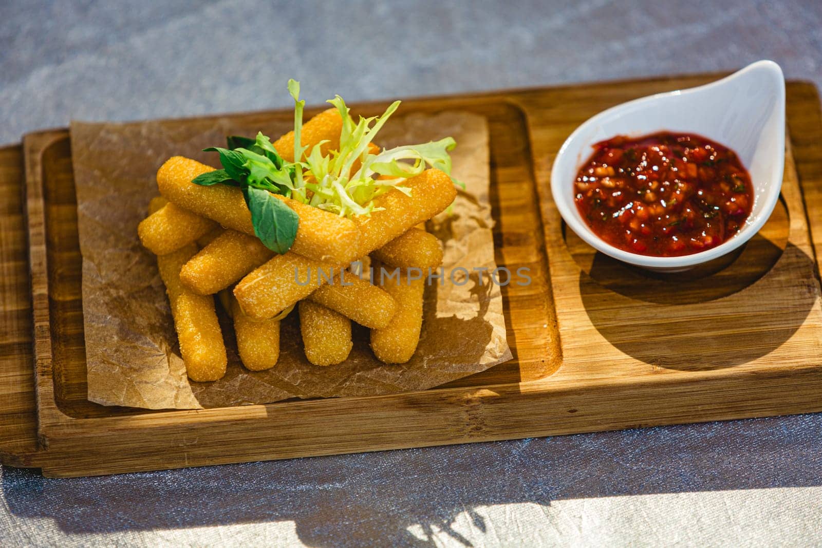 Crispy Halloumi cheese sticks with Chili sauce. Shallow dof by sarymsakov