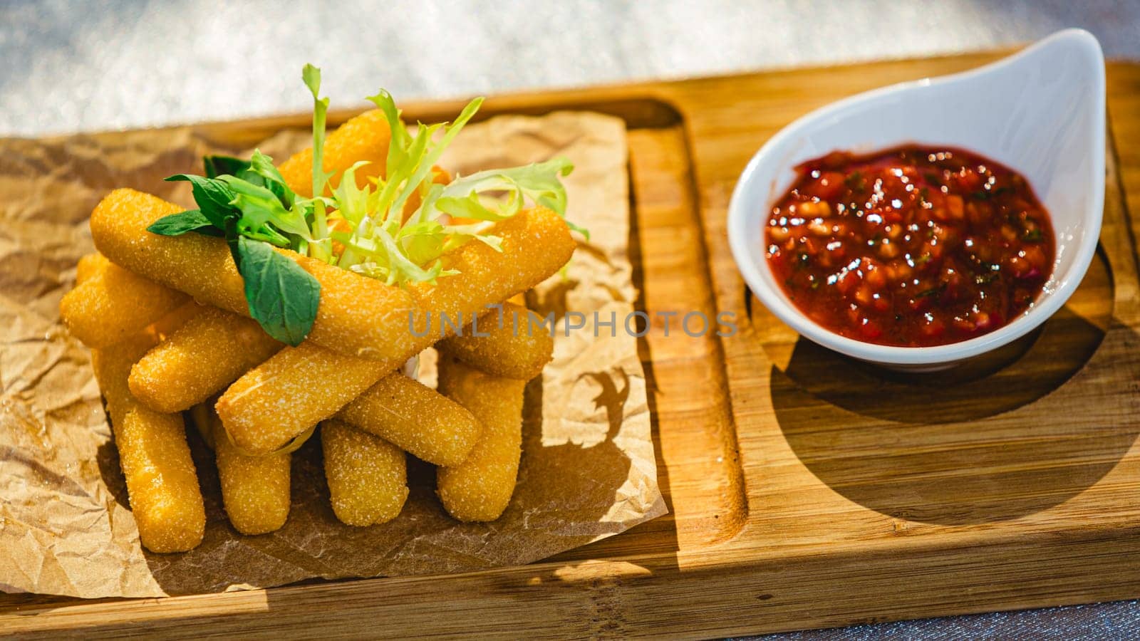 Crispy Halloumi cheese sticks with Chili sauce. Shallow dof by sarymsakov