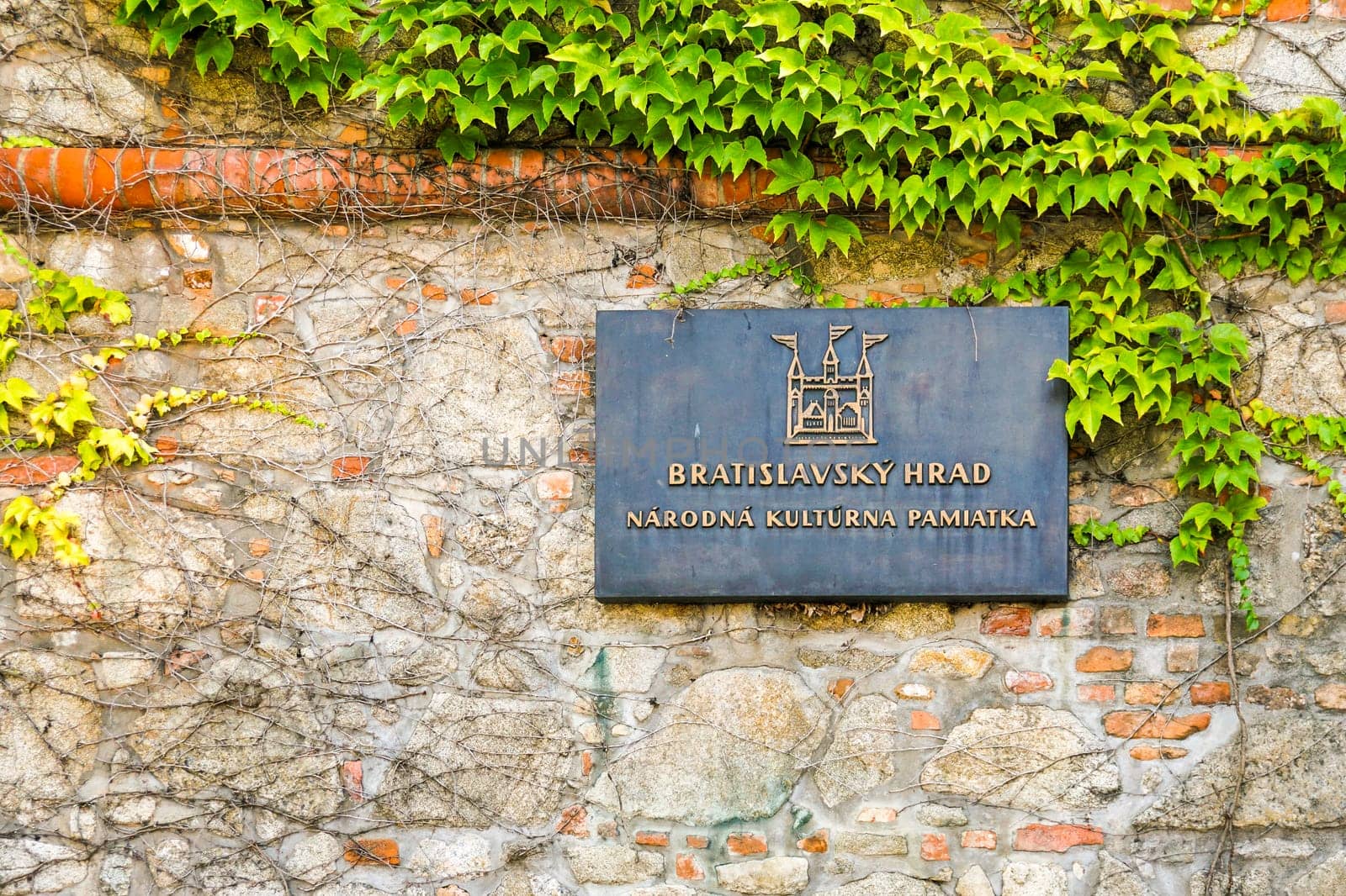A plaque on the castle wall for Bratislava Castle in Bratislava, Slovakia