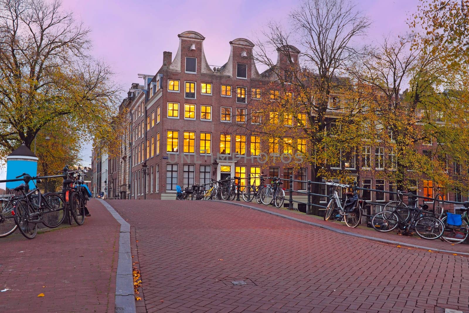 Amsterdam houses at twilight in the Netherlands at sunset