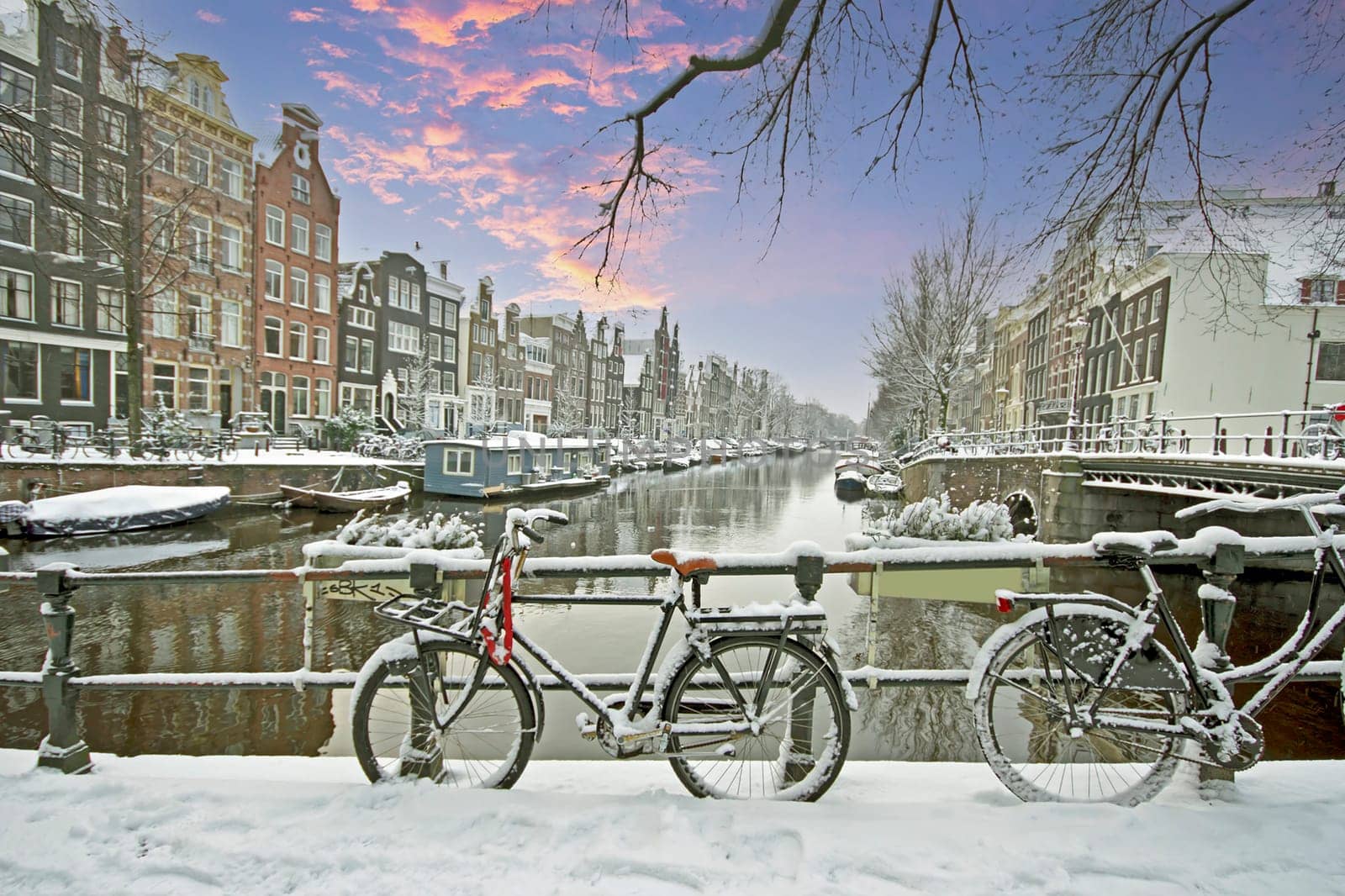 Amsterdam in winter in the Netherlands at sunset