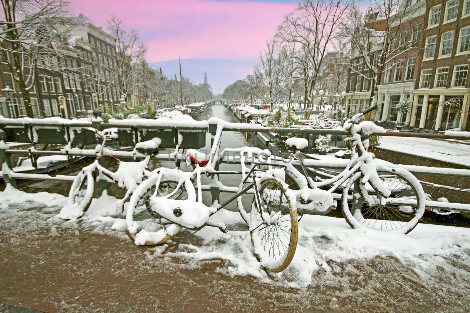 Amsterdam in winter in the Netherlands at sunset