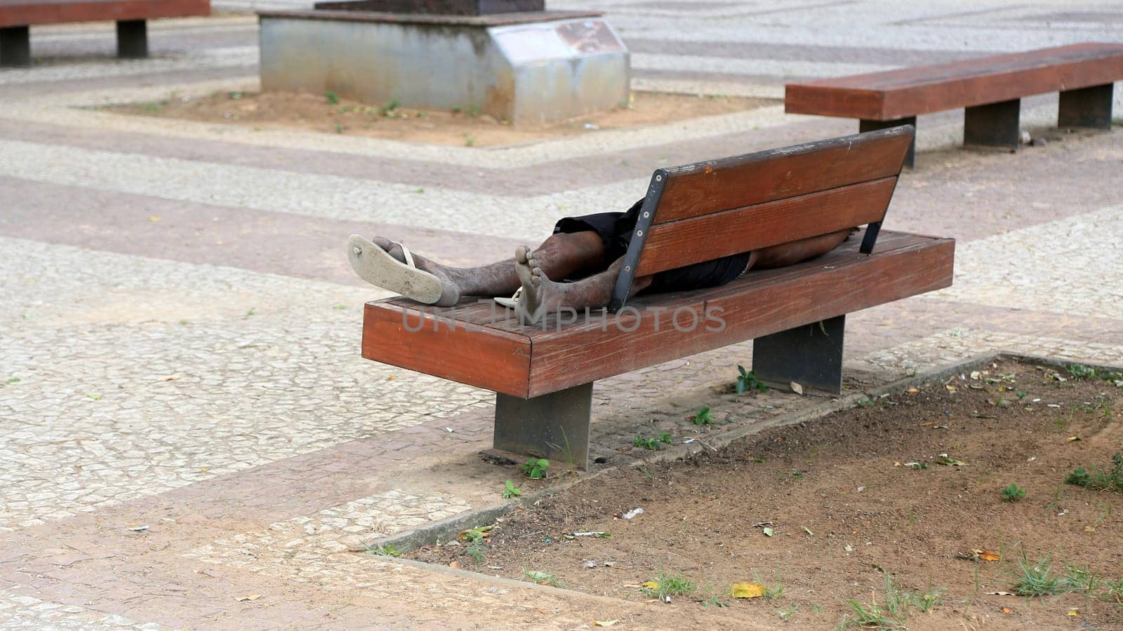 beggar sleeping on the street by joasouza