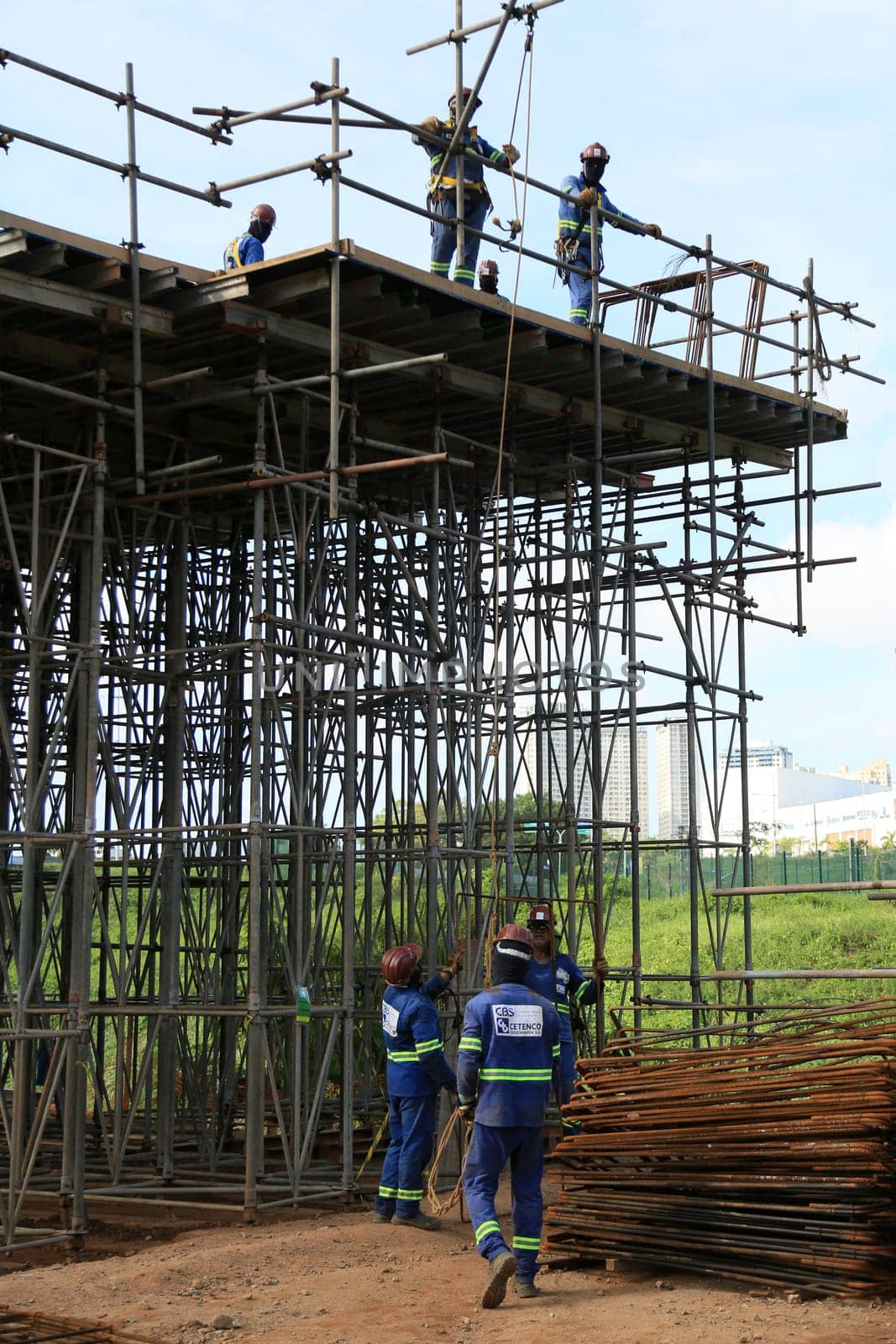 salvador, bahia, brazil -  february 5, 2024: Workers are seen during the construction of a viaduct in the city of Salvador.