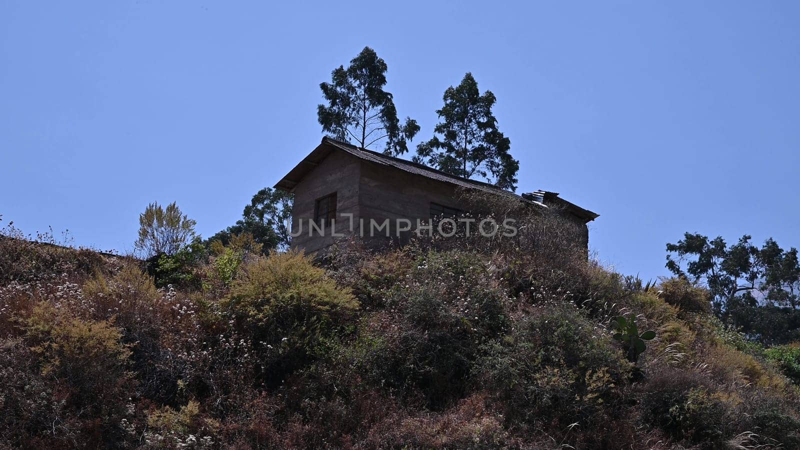 Rural house in the countryside in Canta located north of Lima. House in the town of Canta with a tiled roof. by Peruphotoart