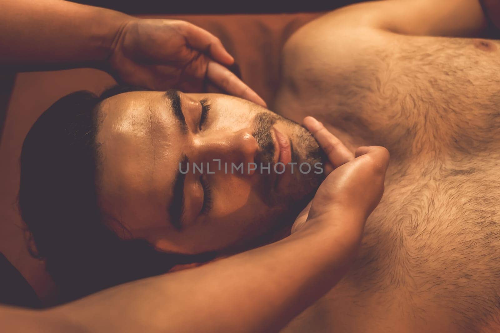 Caucasian man enjoying relaxing anti-stress head massage. Quiescent by biancoblue