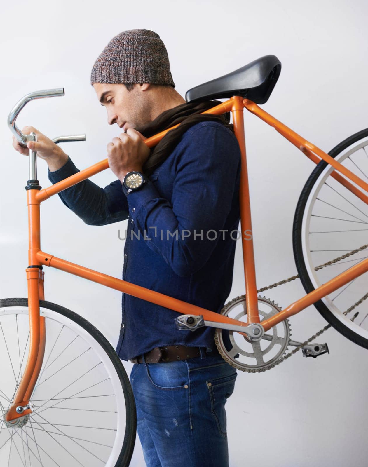 Man, studio and bicycle for sustainability, health and transportation on white background. Hipster cyclist, carbon neutral or eco friendly travel for environmental commute and fitness or exercise by YuriArcurs