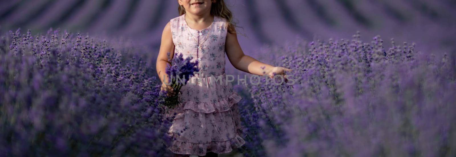 Lavender field girl. happy girl in pink dress in a lilac field of lavender. Aromatherapy concept, lavender oil, photo session in lavender by Matiunina