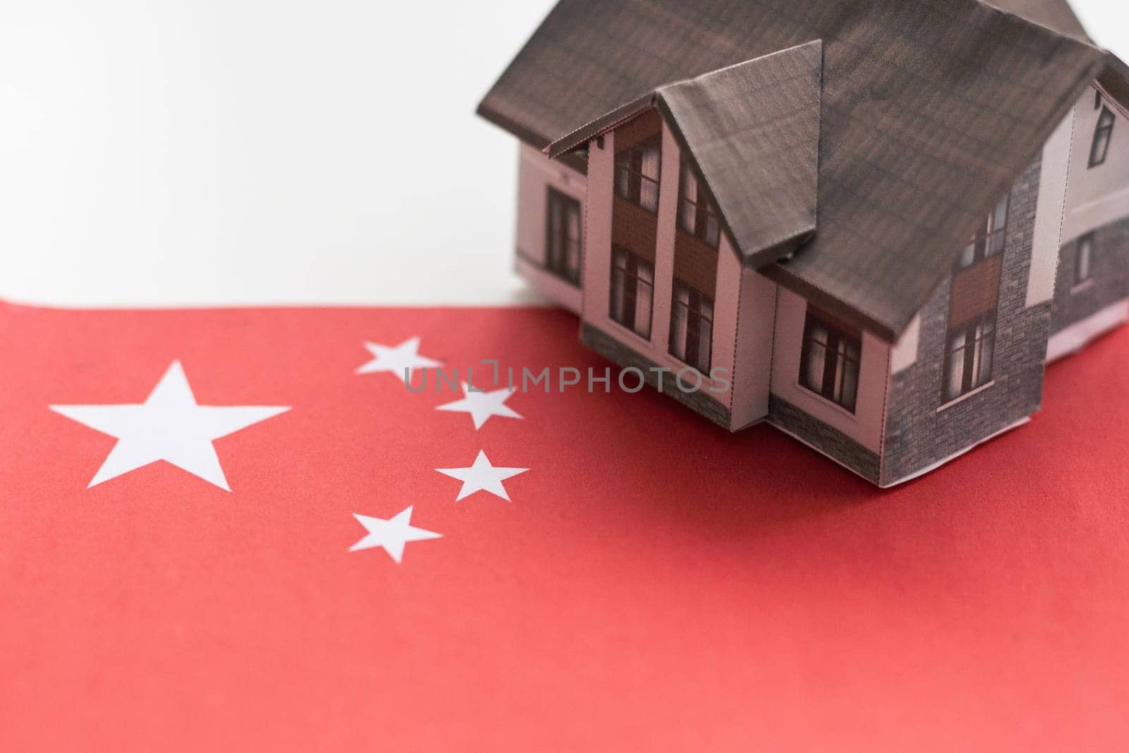 classic house against Chinese flag background. High quality photo
