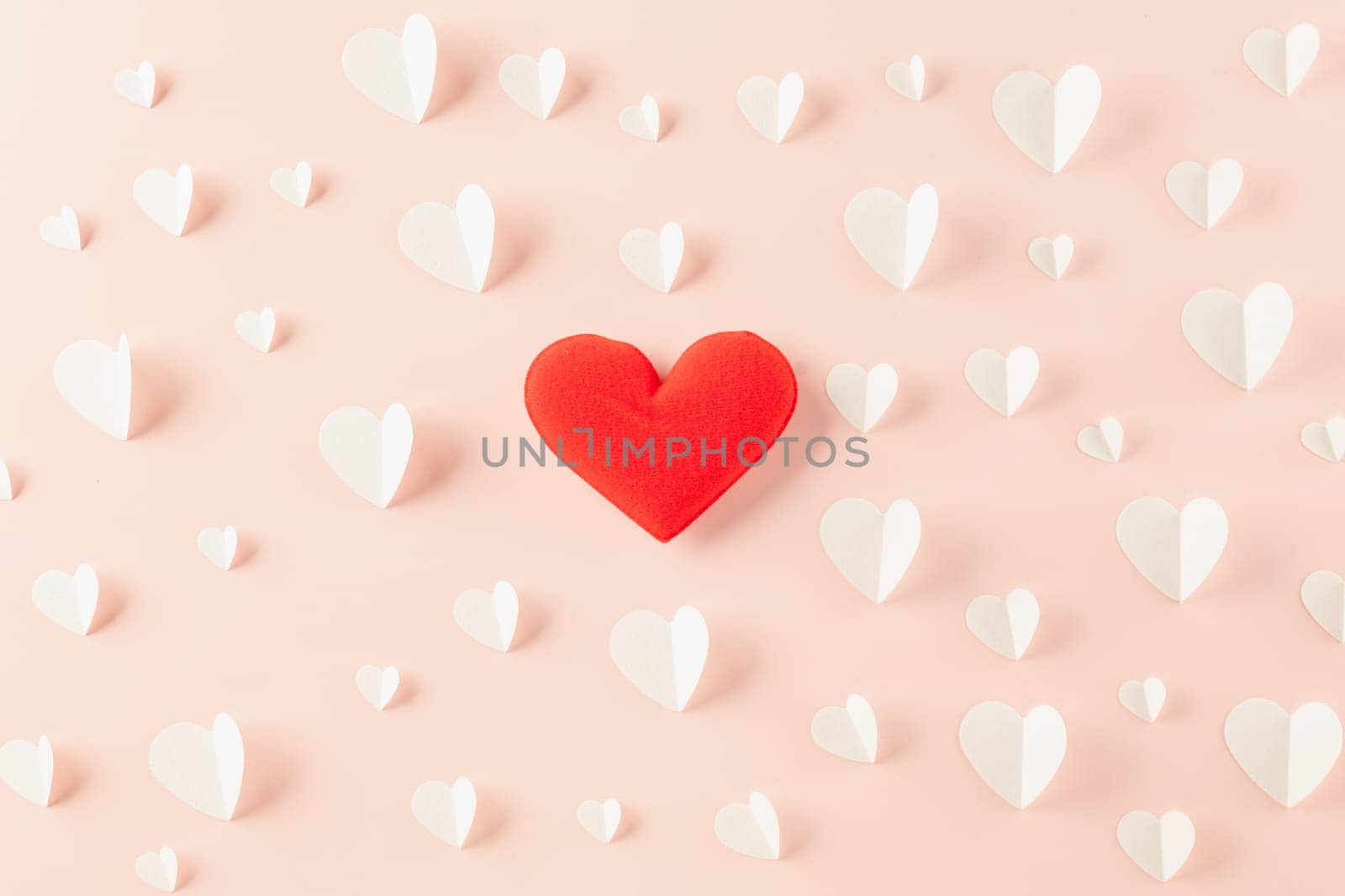 Happy Valentines Day background. Top view flat lay of paper elements cutting white hearts shape flying on pink background with copy space, Happy Mother's Day, Banner template design of holiday