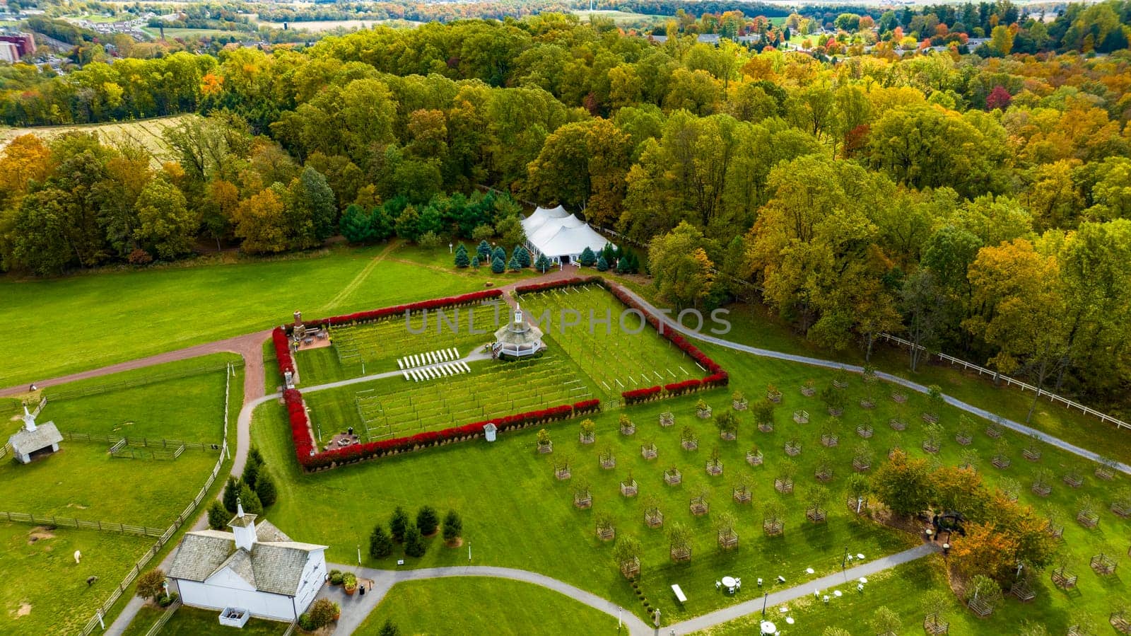 Elizabethtown, Pennsylvania, October 22, 2023 - An Aerial View of a Large Gazebo in the Middle of a Vineyard, With Seating for a Weddings on an Autumn