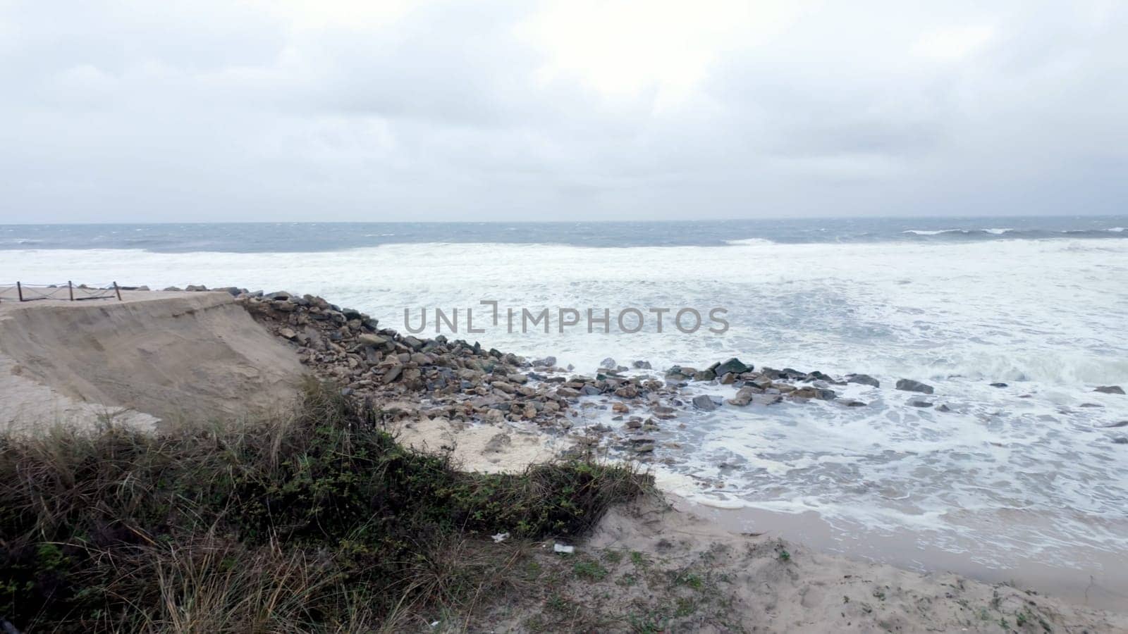 Ovar, Portugal - February 9, 2024: Storm Karlota worsens the fragile dune protection north of Furadouro beach.