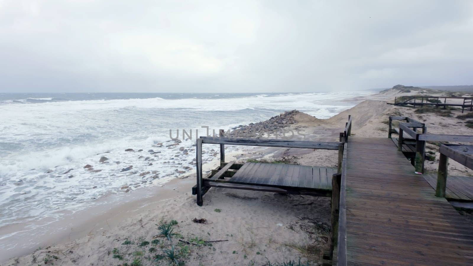 Ovar, Portugal - February 9, 2024: Storm Karlota worsens the fragile dune protection north of Furadouro beach.