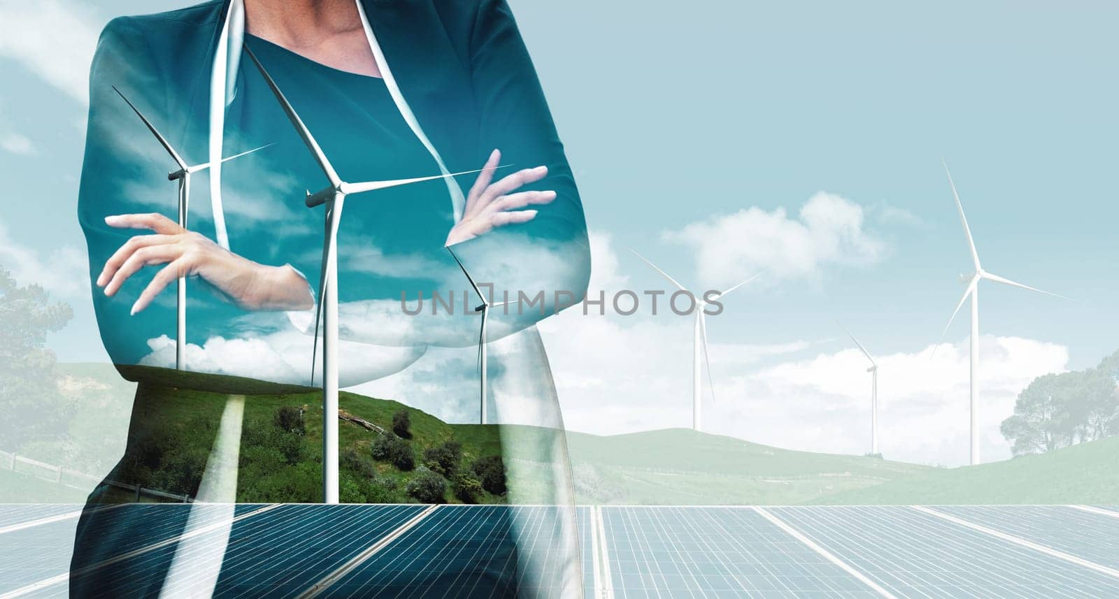 Double exposure graphic of business people working over wind turbine farm and green renewable energy worker interface. Concept of sustainability development by alternative energy. uds