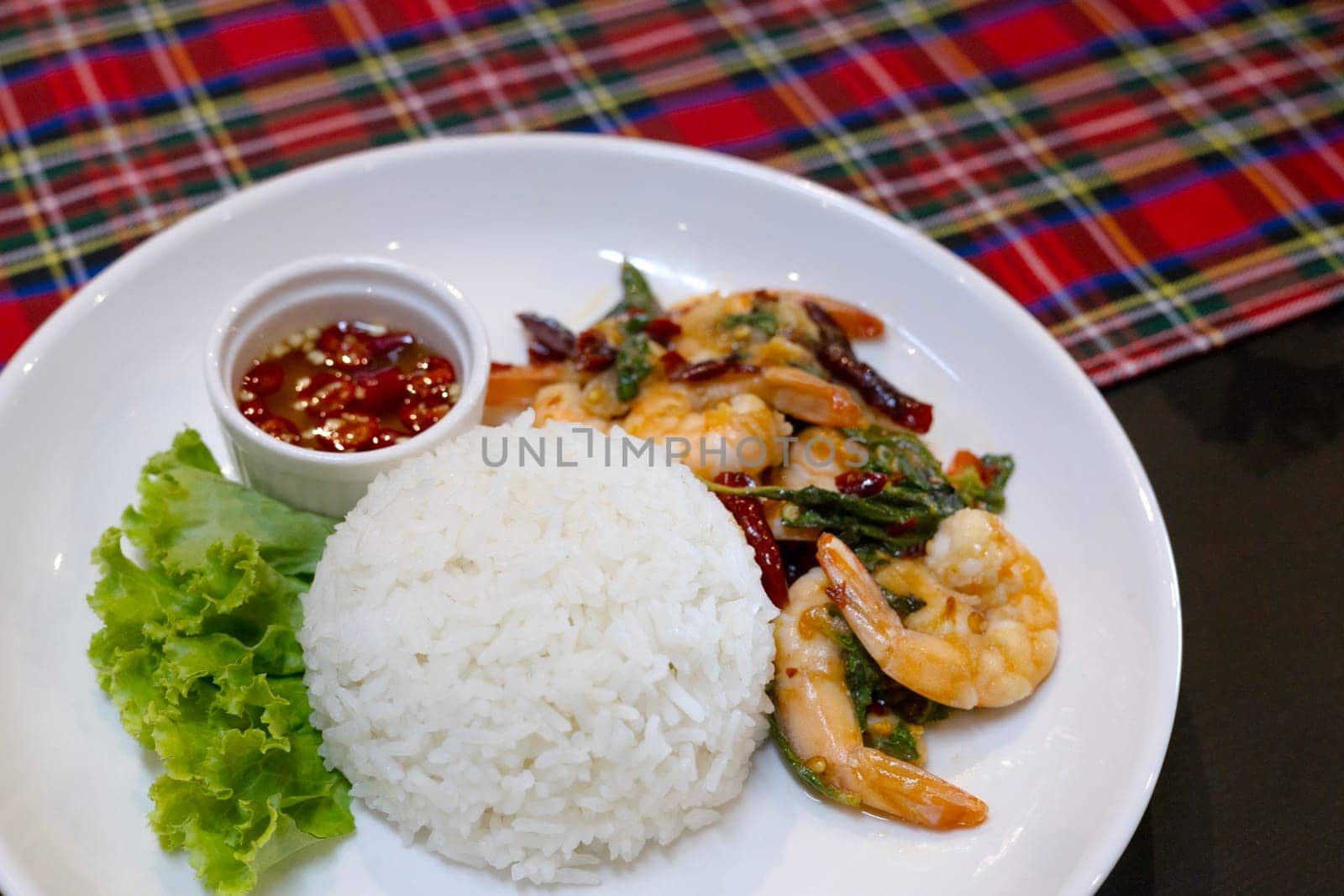 Fried Shrimp With Basil Leaf On Rice by urzine