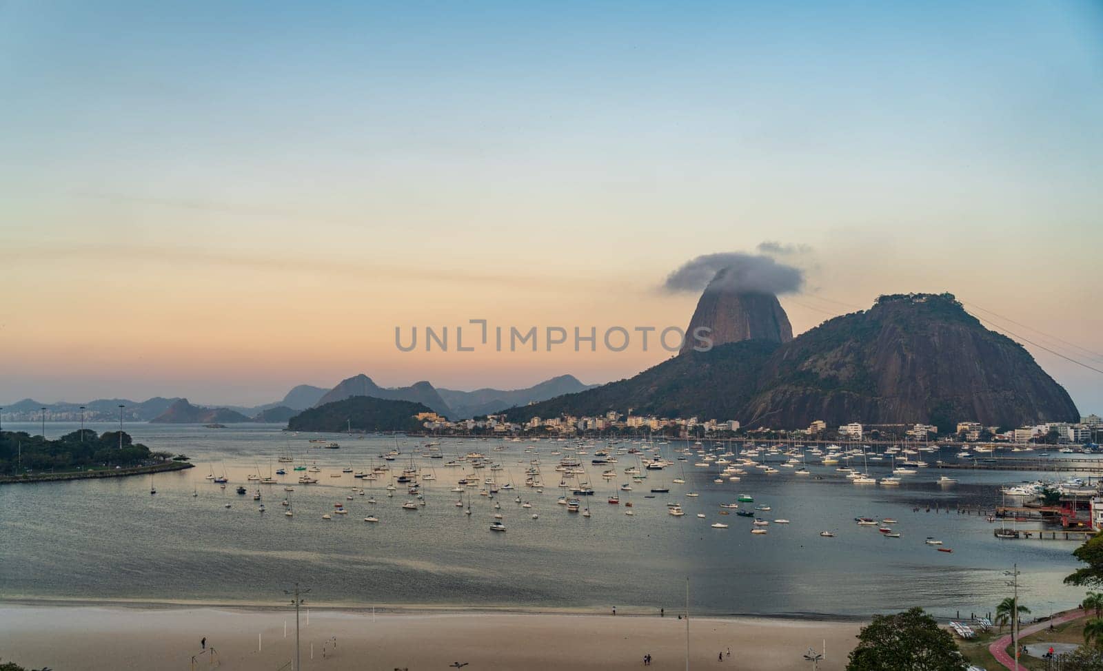 Serene Sunset View Over Botafogo Bay and Sugarloaf Mountain by FerradalFCG