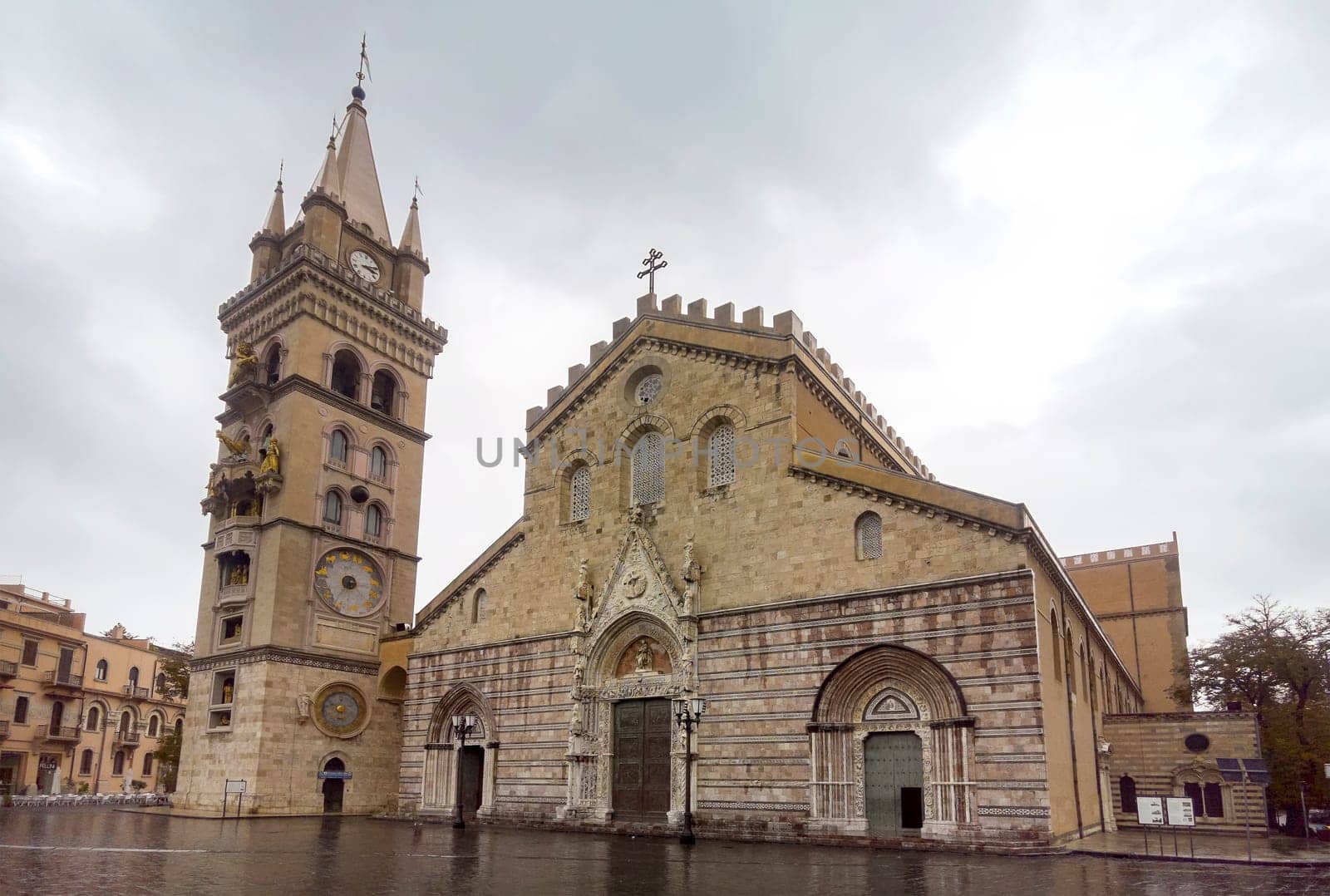 Travel in Italy - Messina Cathedral on Piazza Duomo Square in Messina. Bell Tower is famous for biggest and most complex astronomical clock with gilded bronze statues by EdVal