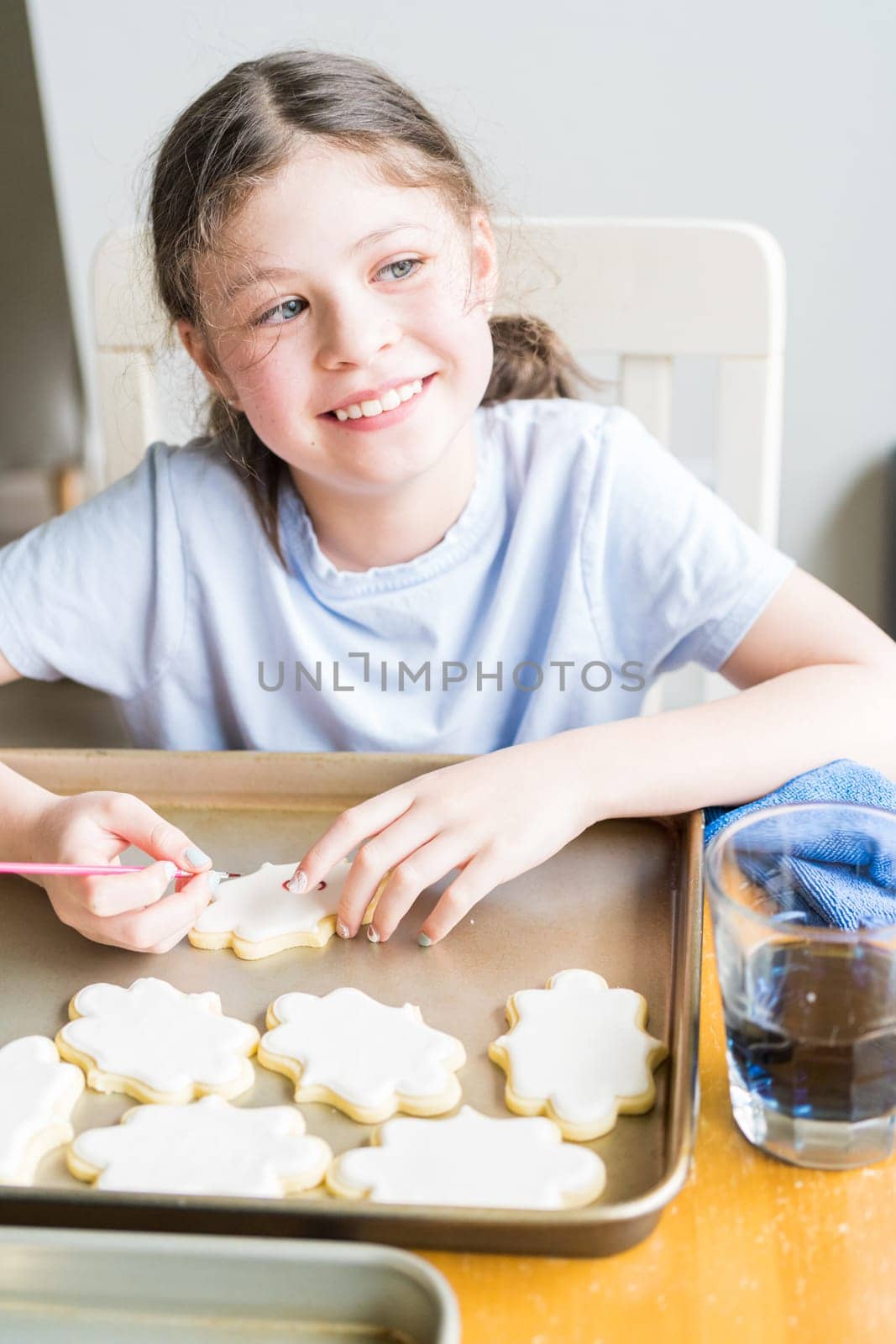 Little Girl Spells 'Sorry' on Iced Sugar Cookies by arinahabich