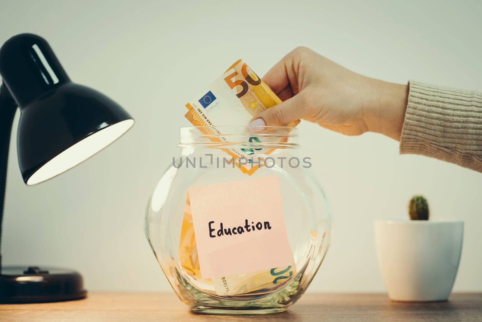 Saving up money for education concept by VitaliiPetrushenko