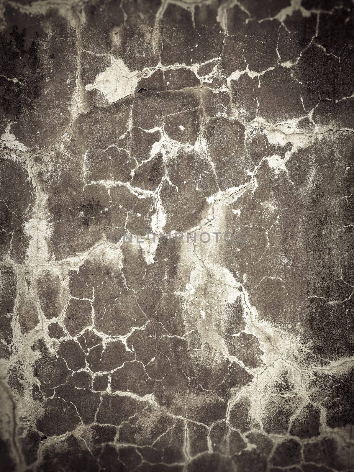 Grey cracked concrete wall texture. Abstract background of crack concrete wall.