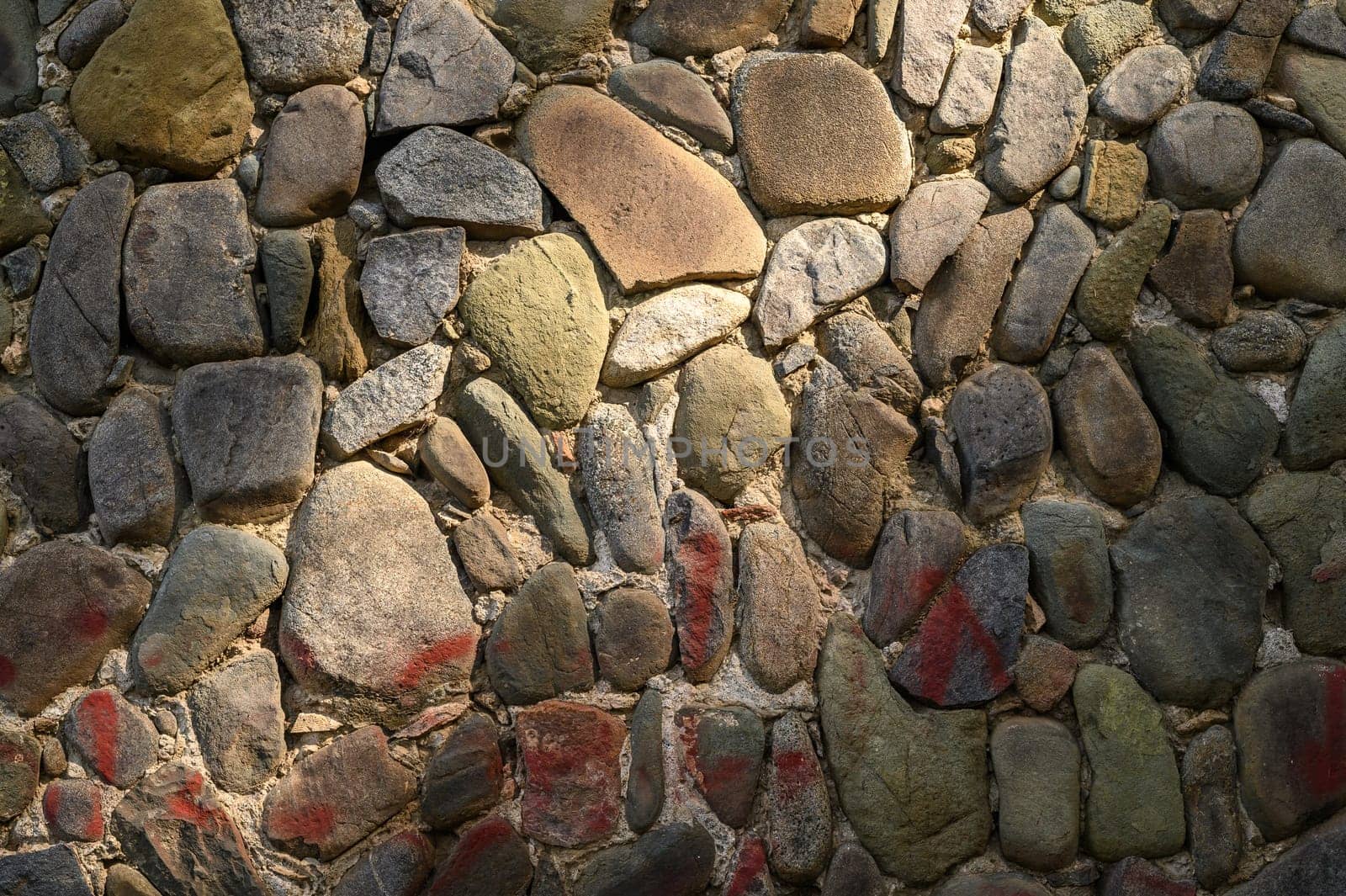 old wall made of real stone in the sun 4 by Mixa74