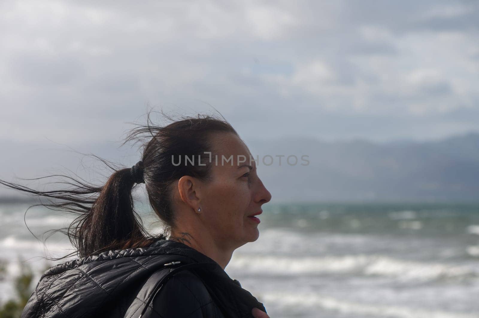 portrait of a woman on the beach in winter in Cyprus 1