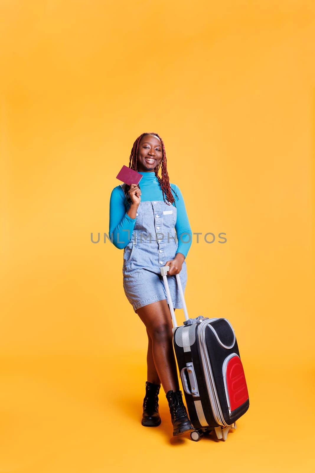Joyful traveller with passport leaving by DCStudio