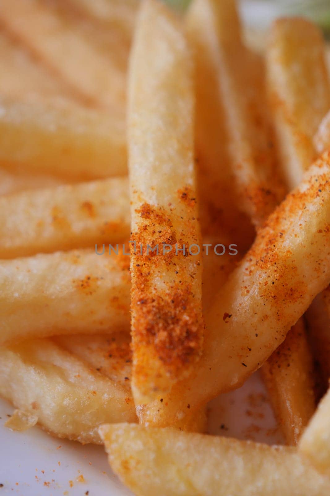 detail shot of French Fries on table .