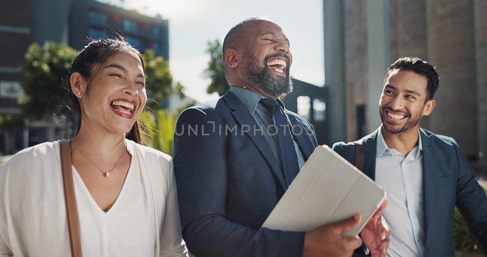 Business people, talking and walking by office buildings in morning, collaboration and travel to workplace in discussion. Teamwork, laughing and accountant with ambition and working in town in cbd.