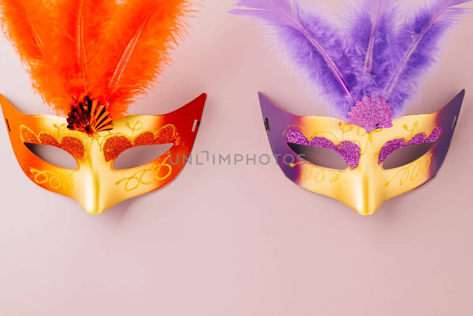 Happy Purim carnival. Carnival mask for Mardi Gras celebration isolated on purple background banner design with copy space, jewish holiday, Purim in Hebrew holiday carnival ball, Venetian mask